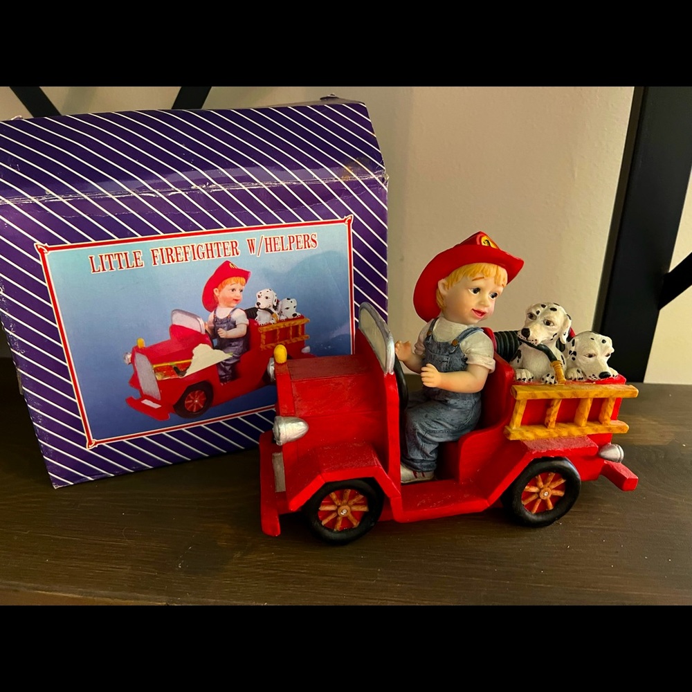 Child’s Fireman & His Truck with 2 Dalmatian Dog Statues.  (NEW)